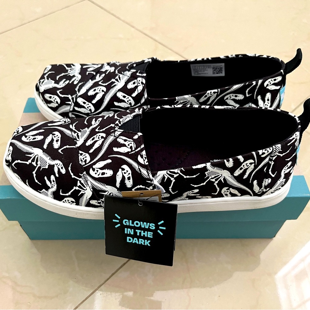 TOMS Alpargata espadrilles. Glow in the dark dinosaur print. Never worn.